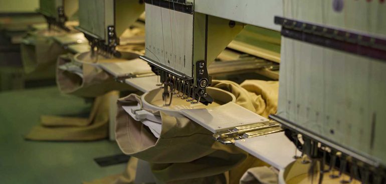 Automatic embroidery machines in action at a factory